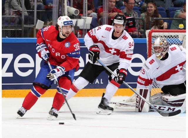 Photo hockey Championnats du monde -  : Norvge (NOR) vs Suisse (SUI) - Sauce Fischer contre sauce Johansen