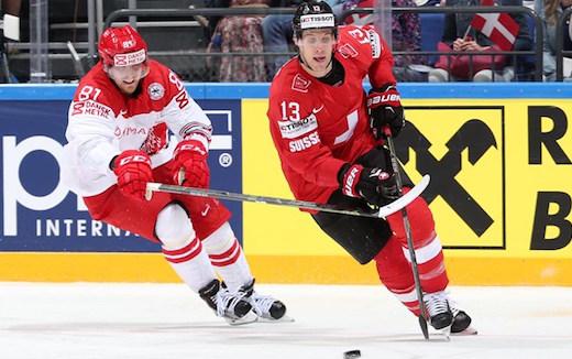 Photo hockey Championnats du monde -  : Suisse (SUI) vs Danemark (DEN) - La Suisse joue avec le feu