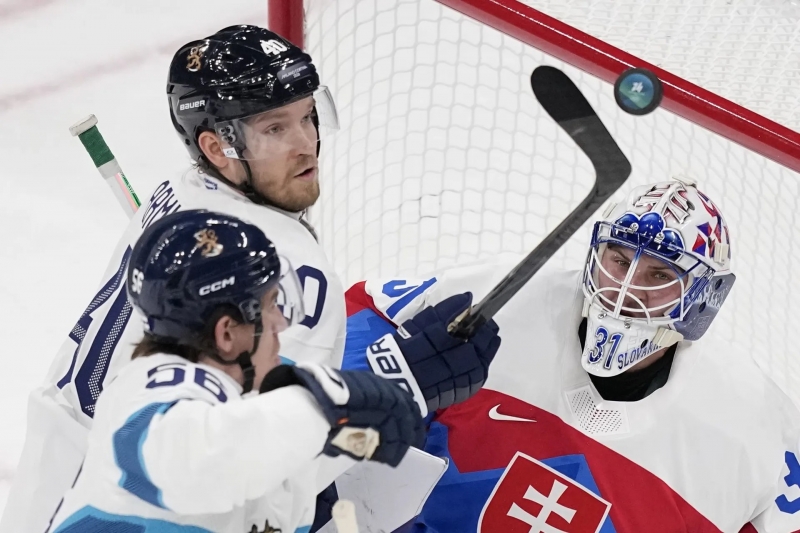 Photo hockey Jeux olympiques -  : Slovaquie (SVK) vs Finlande (FIN) - Le champion olympique pris dans le pi�ge slovaque