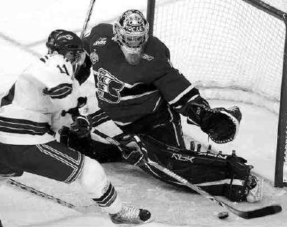 Photo hockey Peut-tre un grand gardien - Hockey dans le Monde