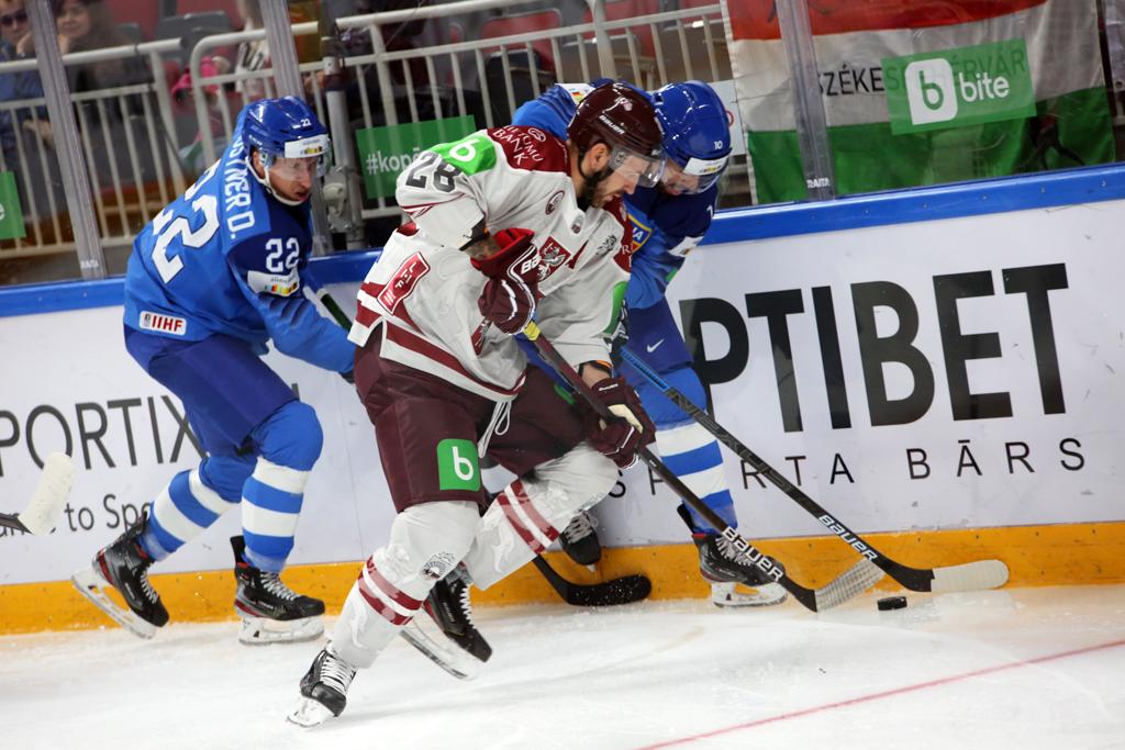 Photo hockey match Italy - Latvia