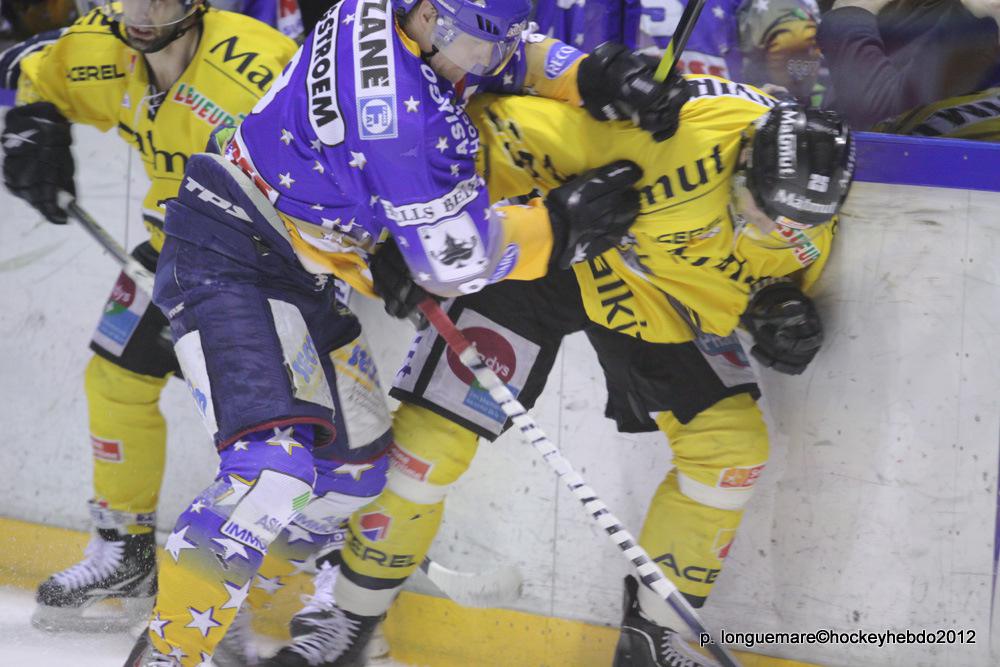 Photo hockey reportage Les Dragons remportent la premire bataille.