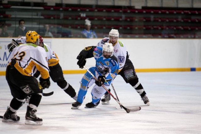 Photo hockey reportage Sous le signe du 3