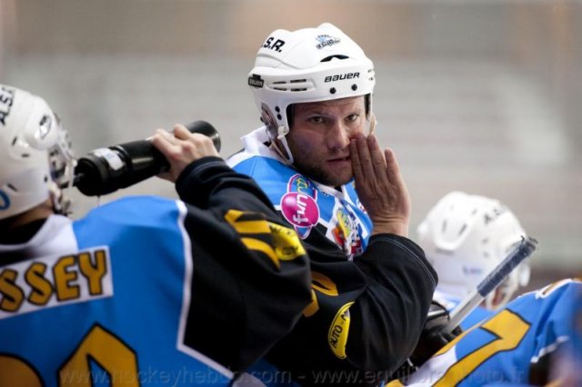 Photo hockey reportage Sous le signe du 3