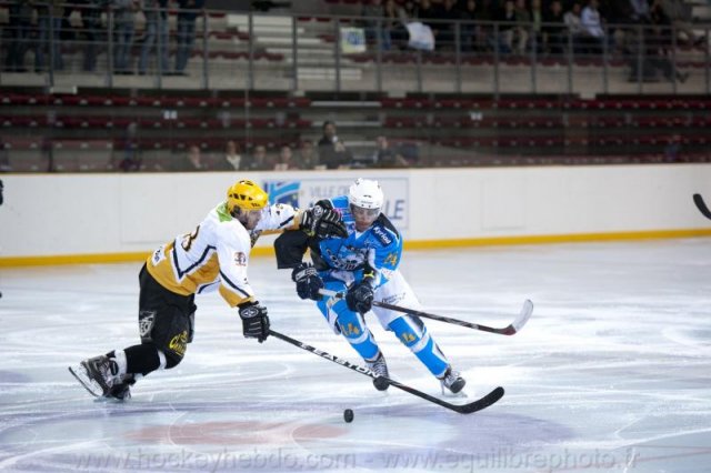 Photo hockey reportage Sous le signe du 3