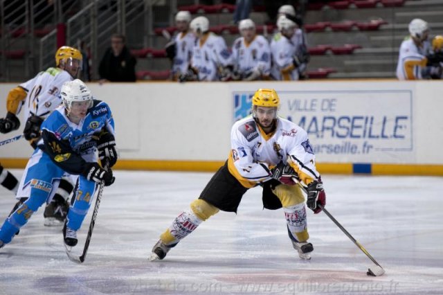 Photo hockey reportage Sous le signe du 3