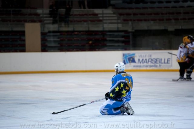 Photo hockey reportage Sous le signe du 3