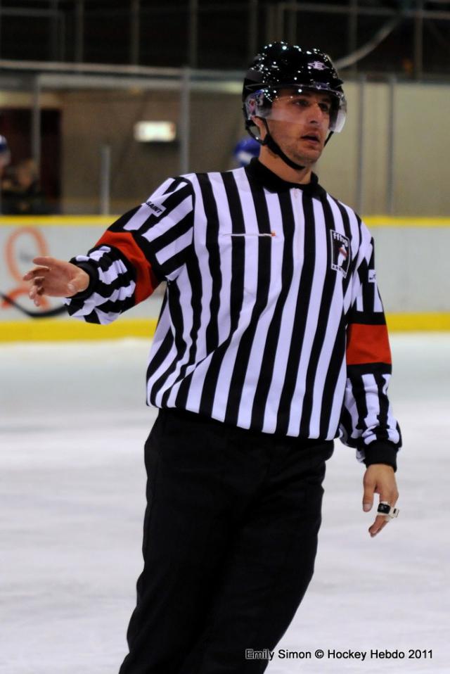 Photo hockey Arbitrage à quatre - Autour du hockey Photo hockey Arbitrage à quatre - Autour du hockey