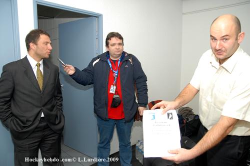 Photo hockey Arbitrer à deux, c\