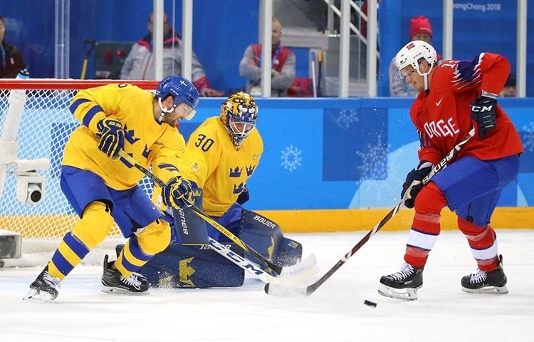 Photo hockey JO : Suédois et Finlandais sans soucis - Jeux olympiques Photo hockey JO : Suédois et Finlandais sans soucis - Jeux olympiques