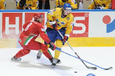 Photo hockey Suède et Bélarus au coude à coude - Championnats du monde Photo hockey Suède et Bélarus au coude à coude - Championnats du monde