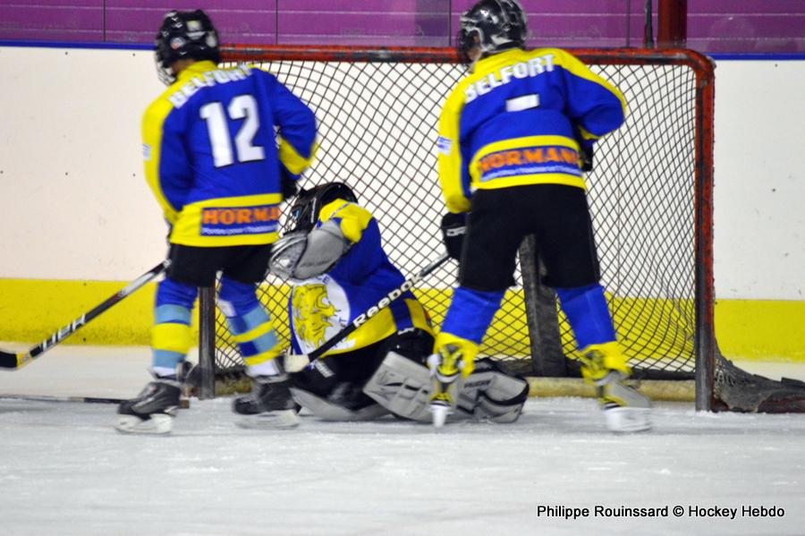 Photo hockey reportage U11 : Dos à dos